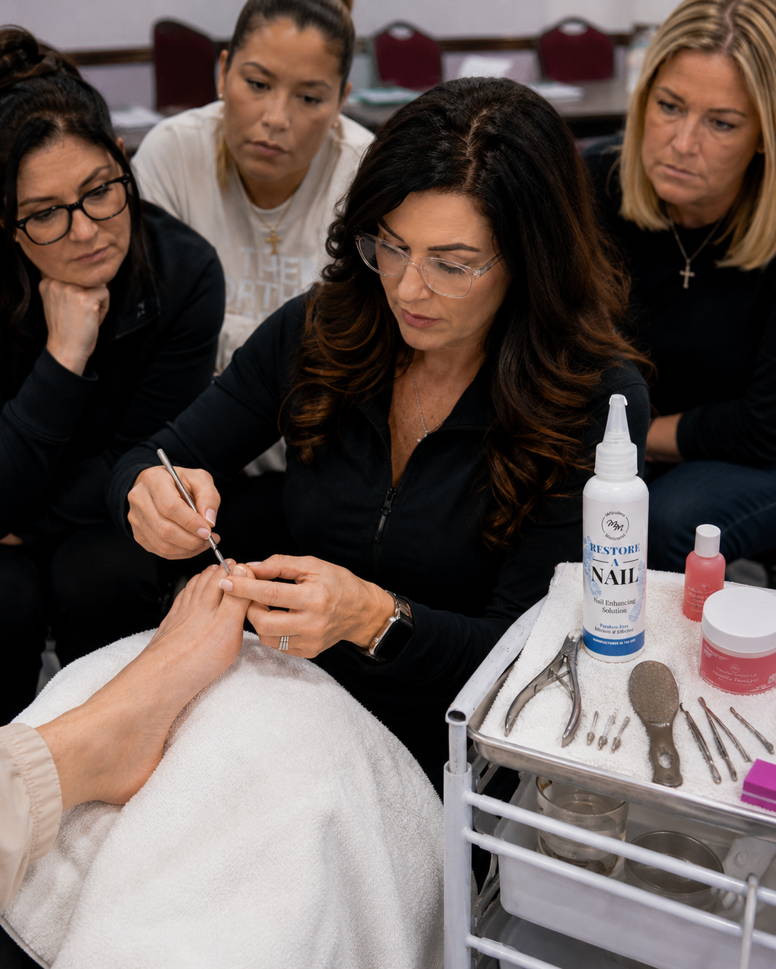 Lori Halloway teaching at-home pedicure techniques